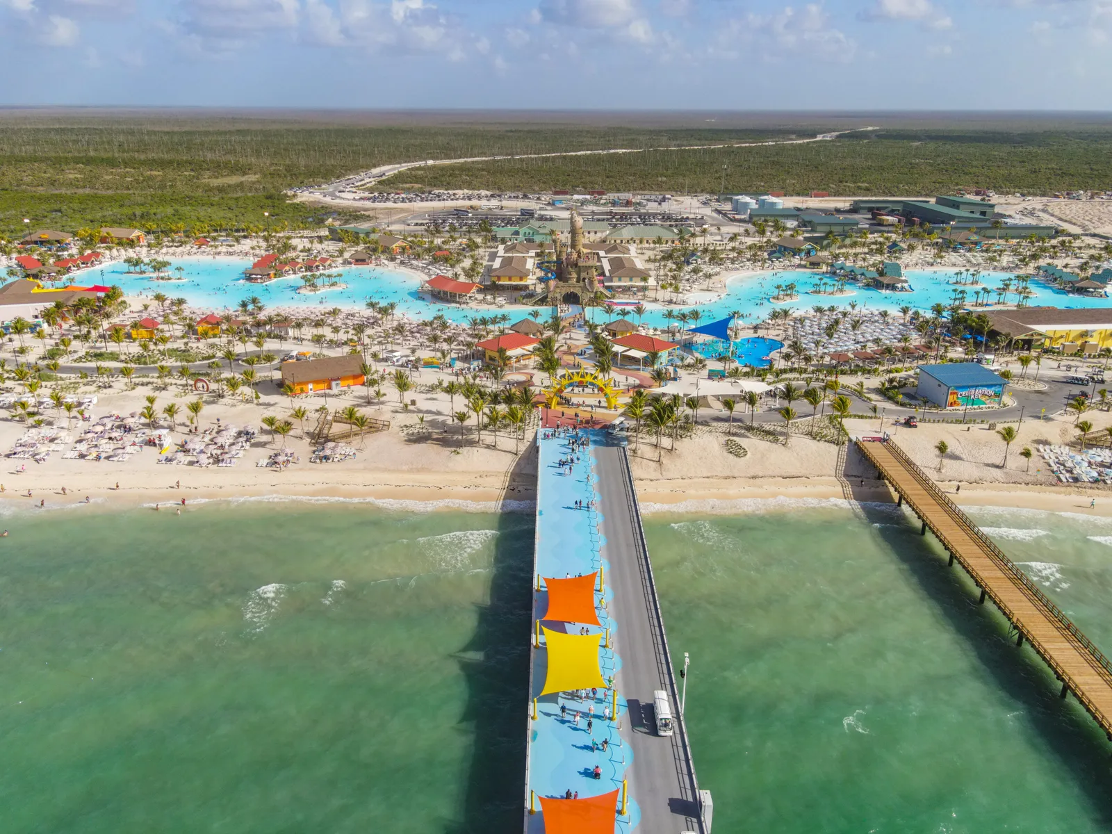 Aerial view of Celebration Key’s lagoons, Suncastle and beach