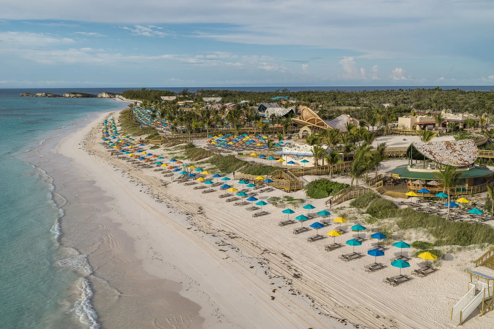 Aerial view of the beach and pavilions at Disney Lookout Cay