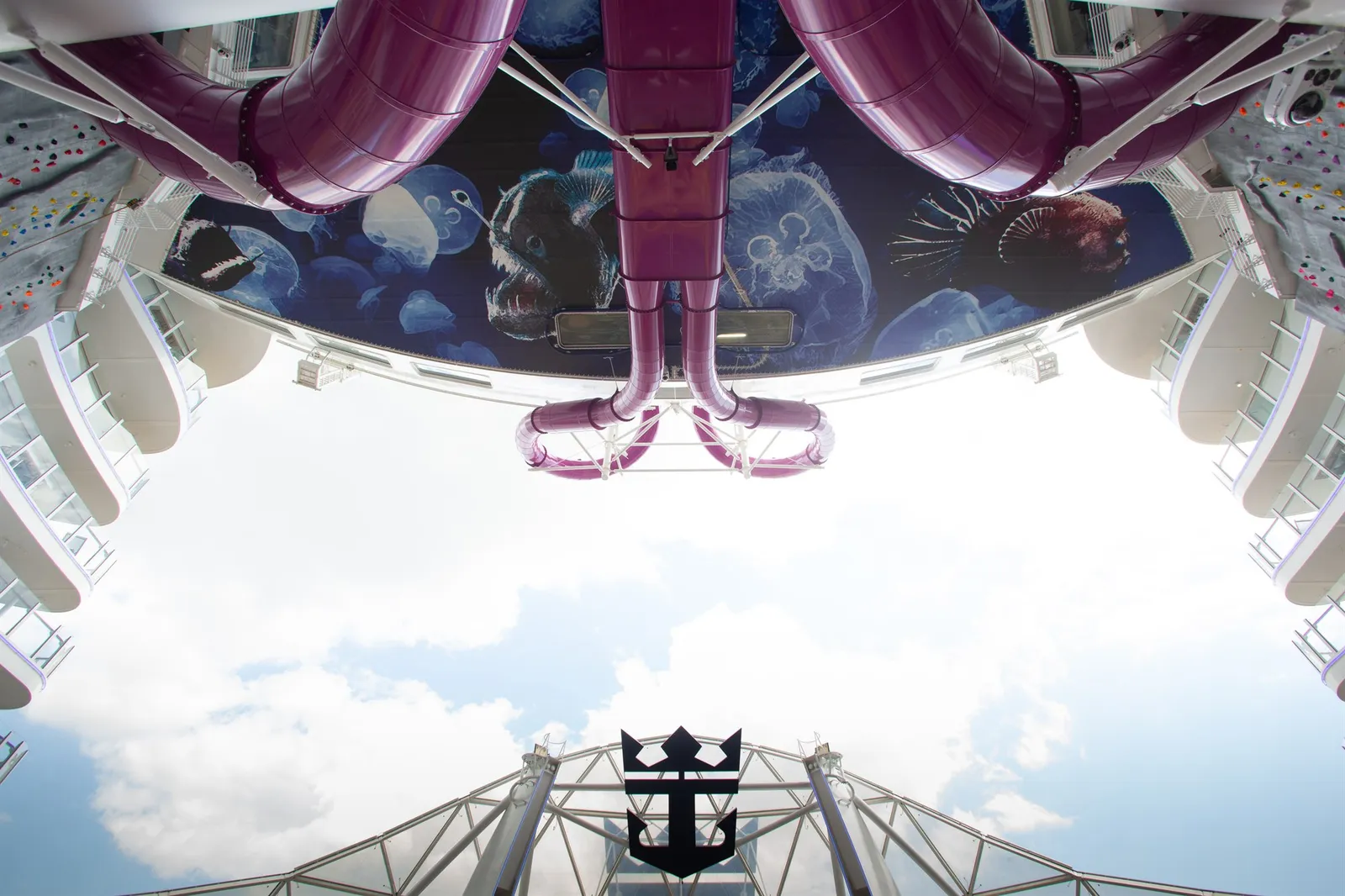 Looking up at The Ultimate Abyss slide tubes on Utopia of the Seas